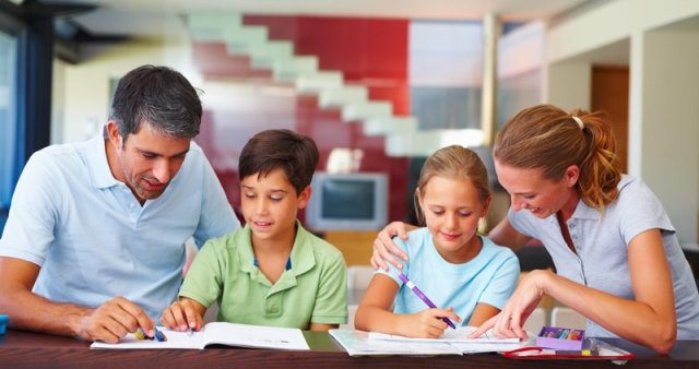 Children reading books with their parents